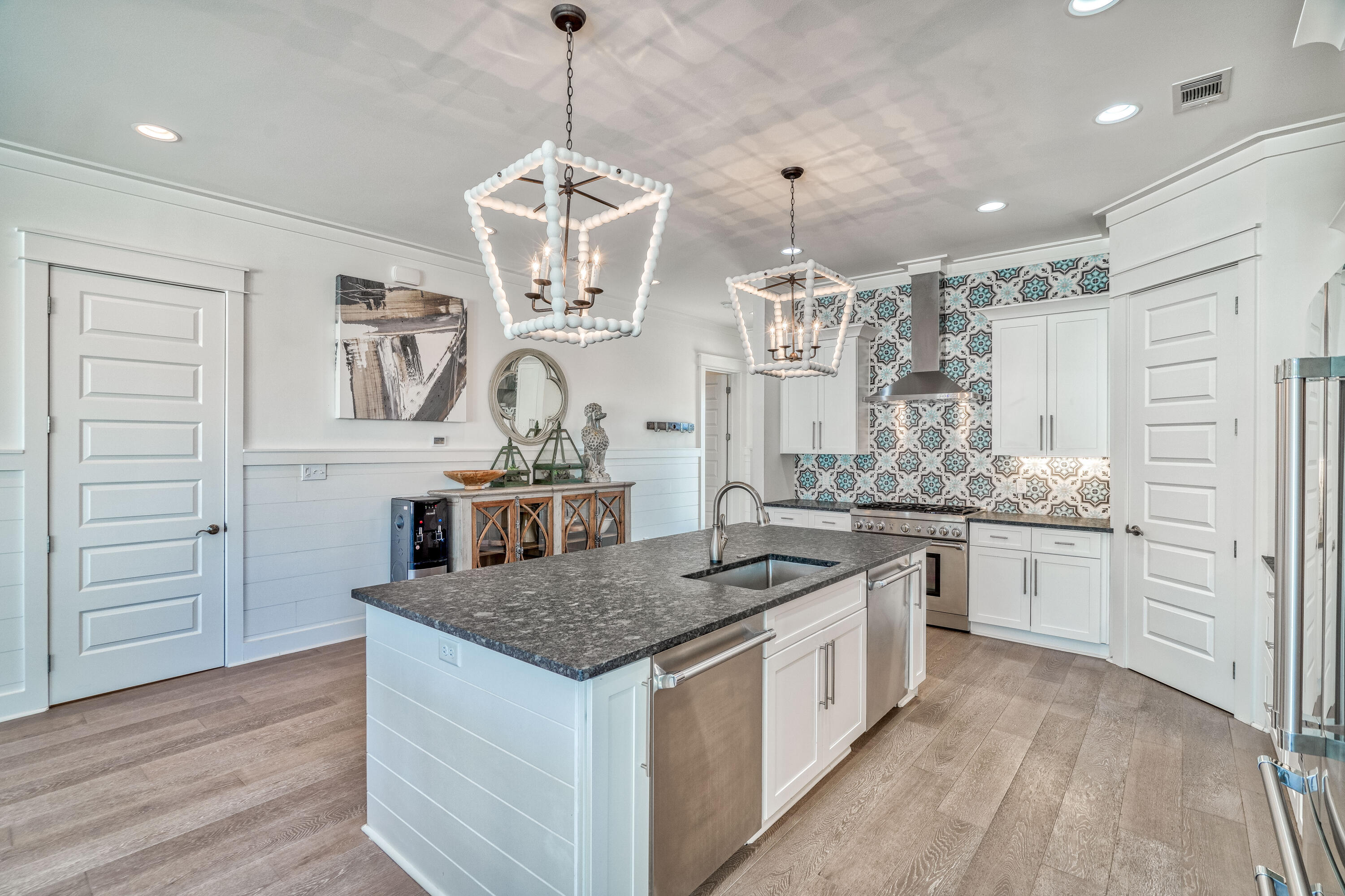 101 A St Inlet Beach Inlet Beach, FL 32461 - Photo 5 of 47 a kitchen with stainless steel appliances granite countertop a sink stove and refrigerator
