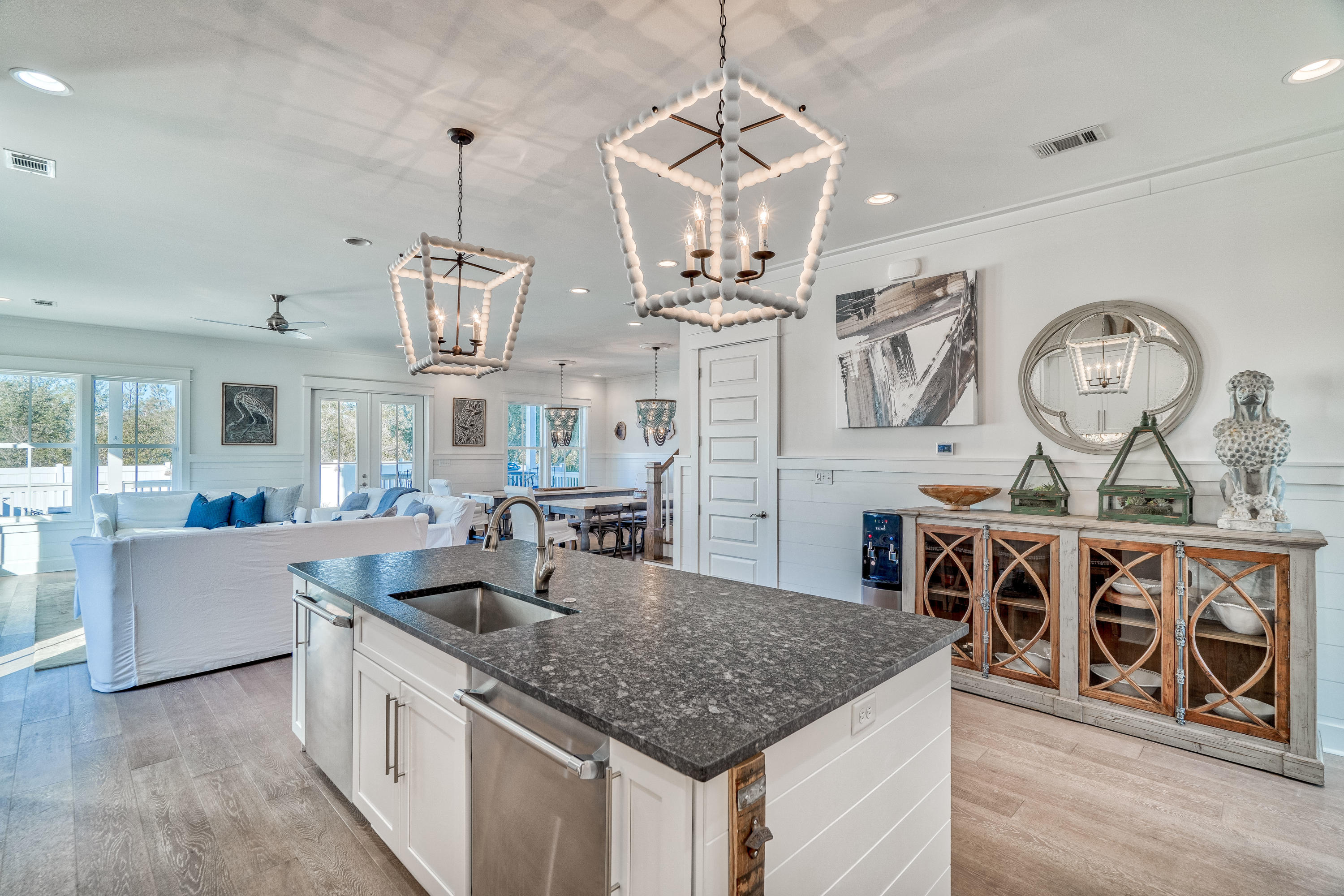 101 A St Inlet Beach Inlet Beach, FL 32461 - Photo 6 of 47 a kitchen with stainless steel appliances granite countertop a sink a oven and a wooden floors