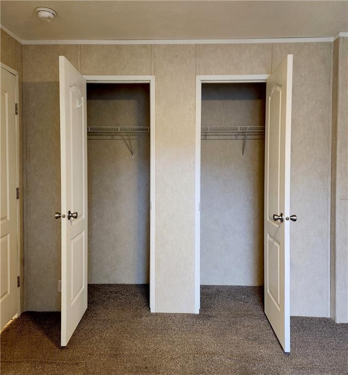355 Route 30, Unit 89 Clinton, PA 15026 - Photo 6 of 13 a view of an empty room with closet and wooden floor
