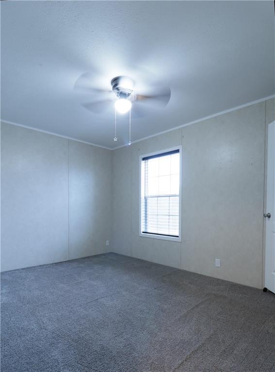 355 Route 30, Unit 89 Clinton, PA 15026 - Photo 9 of 13 an empty room with a chandelier fan and windows