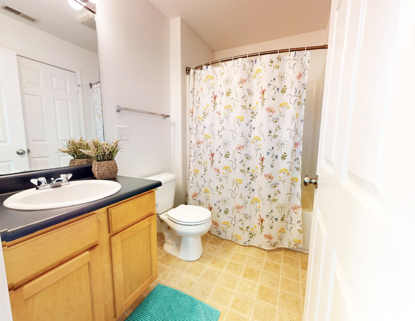 609 Corey Lane Champaign, IL 61822 - Photo 8 of 10 a bathroom with a sink toilet and shower