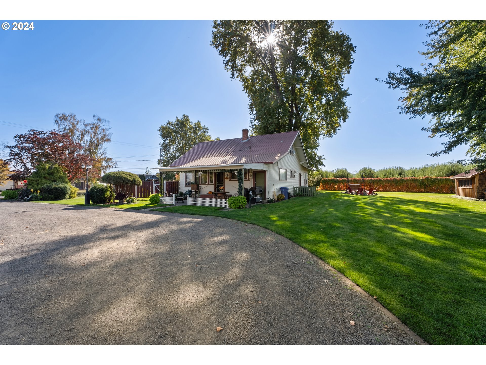 84768 Eastside Road Milton Freewater, OR 97862 - Photo 12 of 43 a front view of a house with a yard