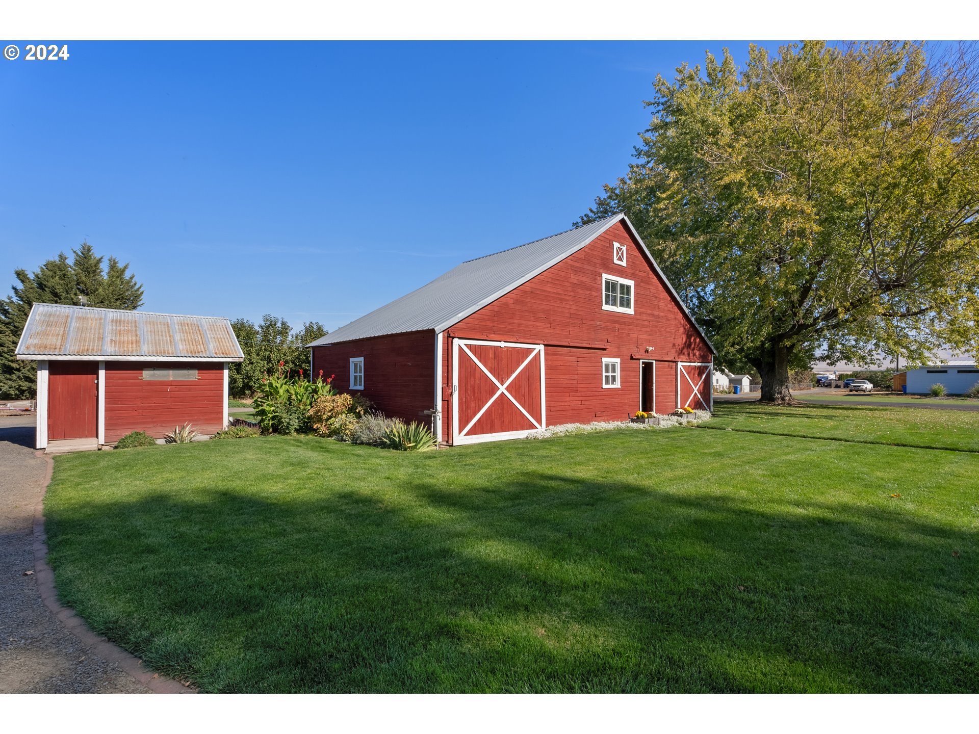 84768 Eastside Road Milton Freewater, OR 97862 - Photo 19 of 43 a front view of a house with a yard