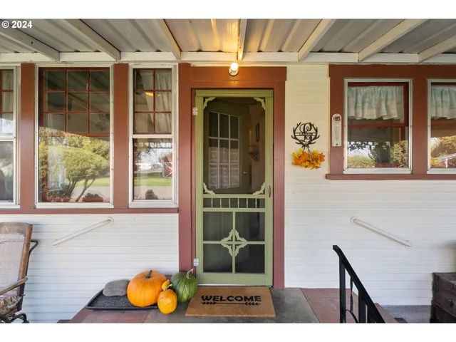 a kitchen with kitchen island a sink stove and cabinets