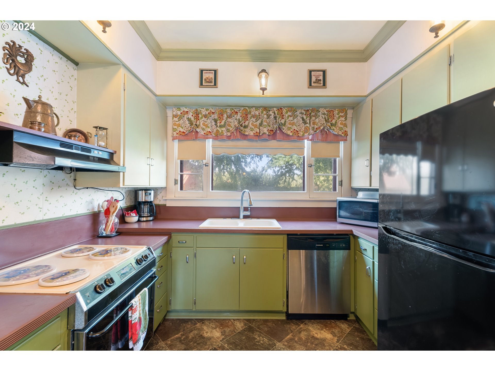 84768 Eastside Road Milton Freewater, OR 97862 - Photo 25 of 43 a kitchen with kitchen island a sink stove and cabinets