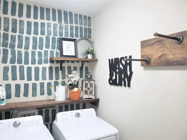a utility room with dryer and washer
