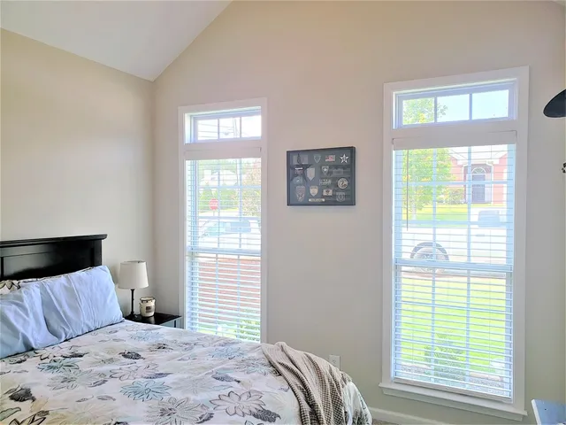 a bedroom with a bed and furniture