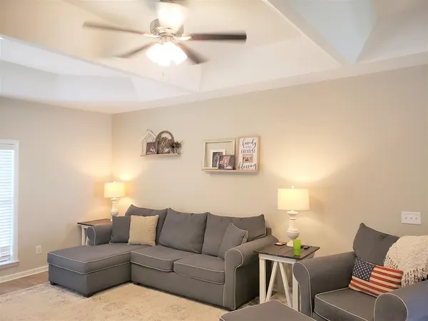 a living room with furniture and a couch