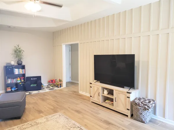 a living room with a fireplace