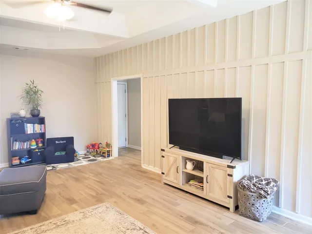 a living room with a fireplace