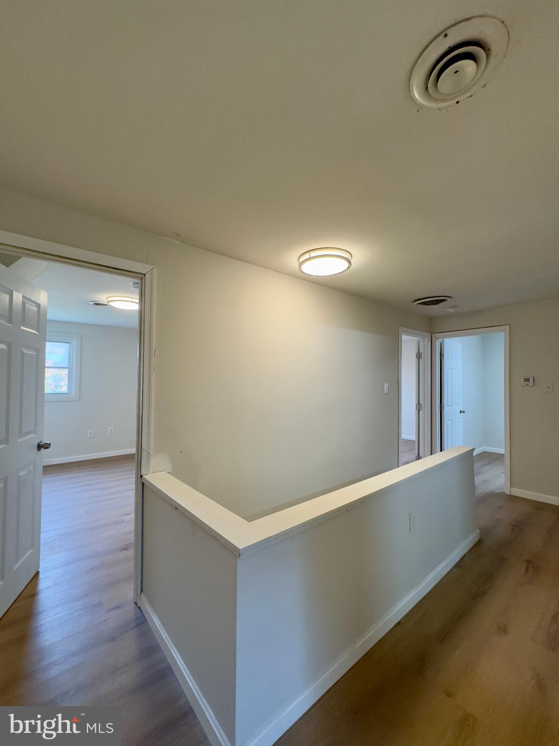 815 Seneca Park Road Middle River, MD 21220 - Photo 13 of 23 wooden floor in a hall with an entryway
