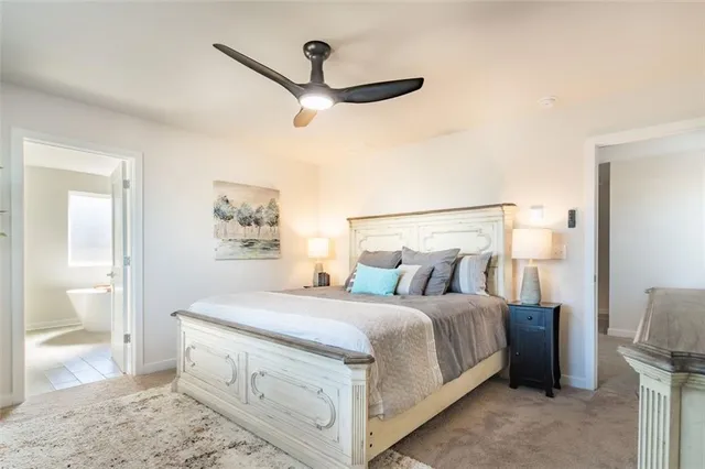 a bedroom with a bed and a walk in closet