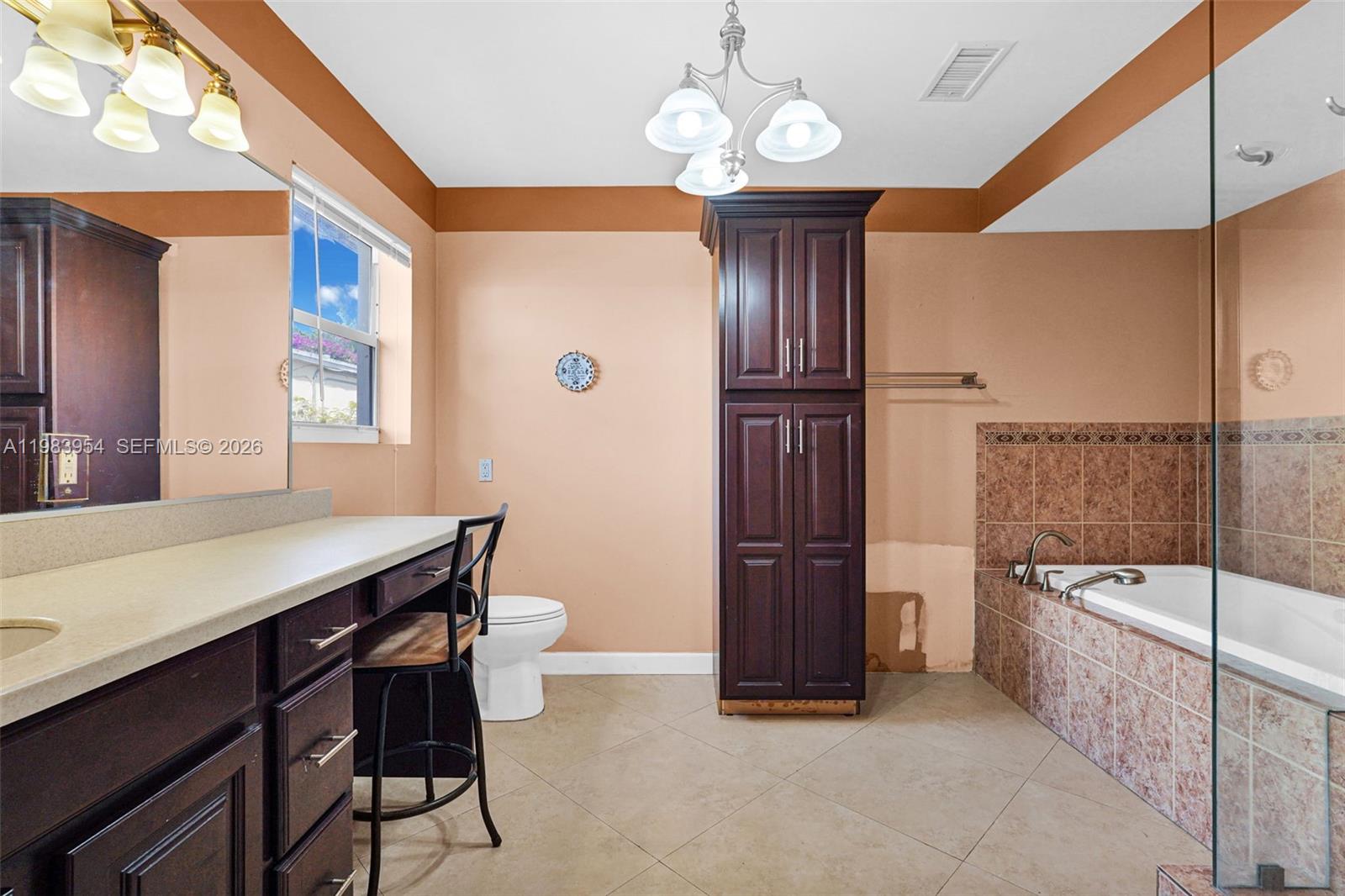 4560 Prairie Avenue Miami Beach, FL 33140 - Photo 14 of 15 a view of a dining room with furniture window and wooden floor