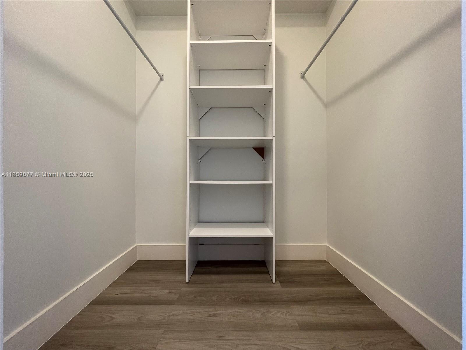 5085 Northwest 7th Street, Unit 1203 Miami, FL 33126 - Photo 17 of 26 a view of an empty room with a window