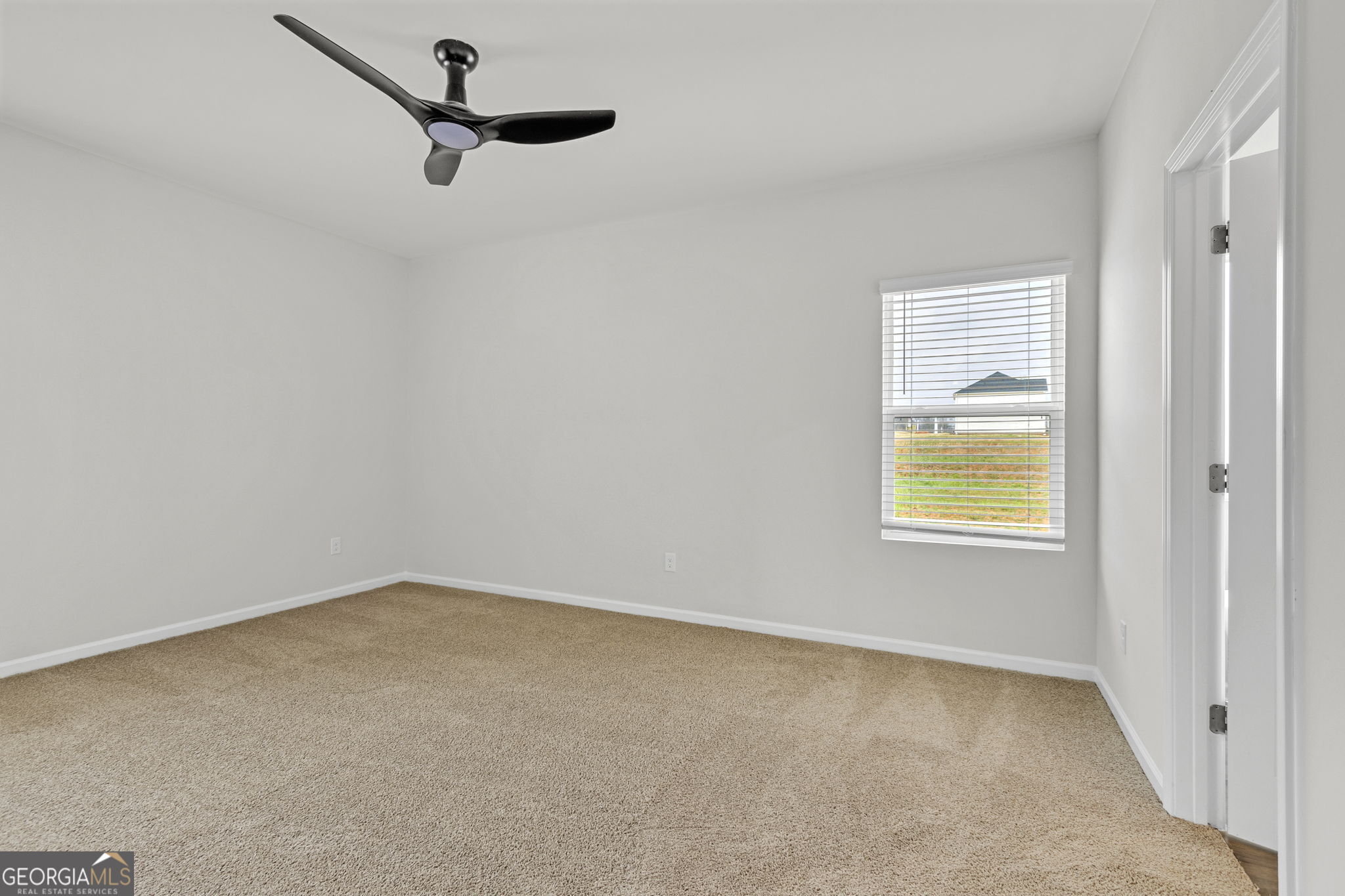 506 Holsteiner Road, Unit 64 Hogansville, GA 30230 - Photo 18 of 21 an empty room with windows