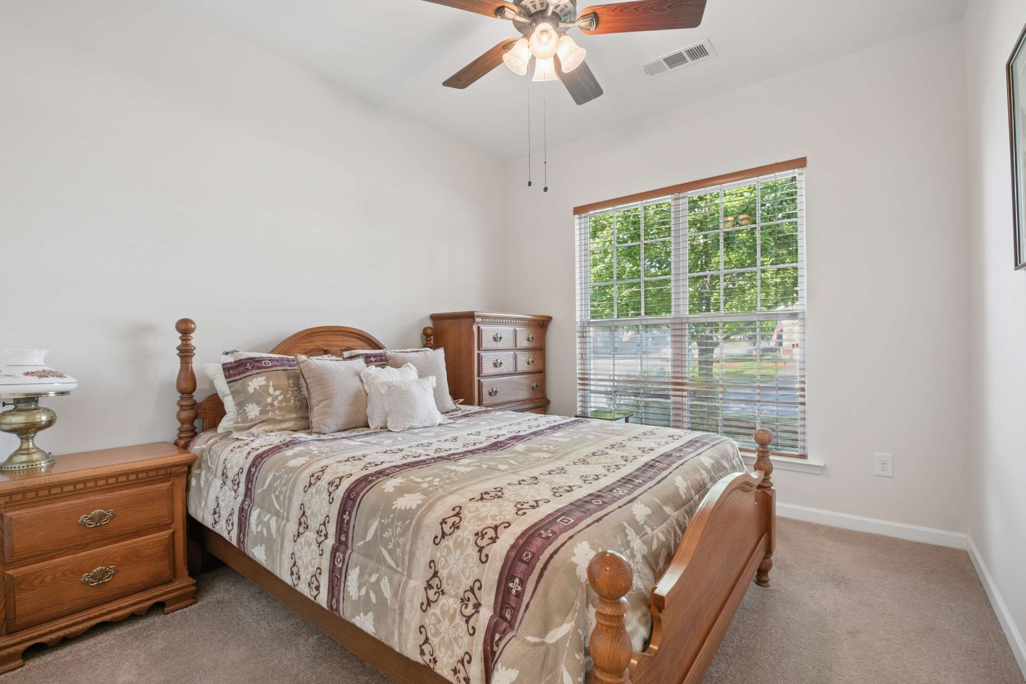 300 Blockade Lane Mount Juliet, TN 37122 - Photo 19 of 36 a bedroom with a bed and a window