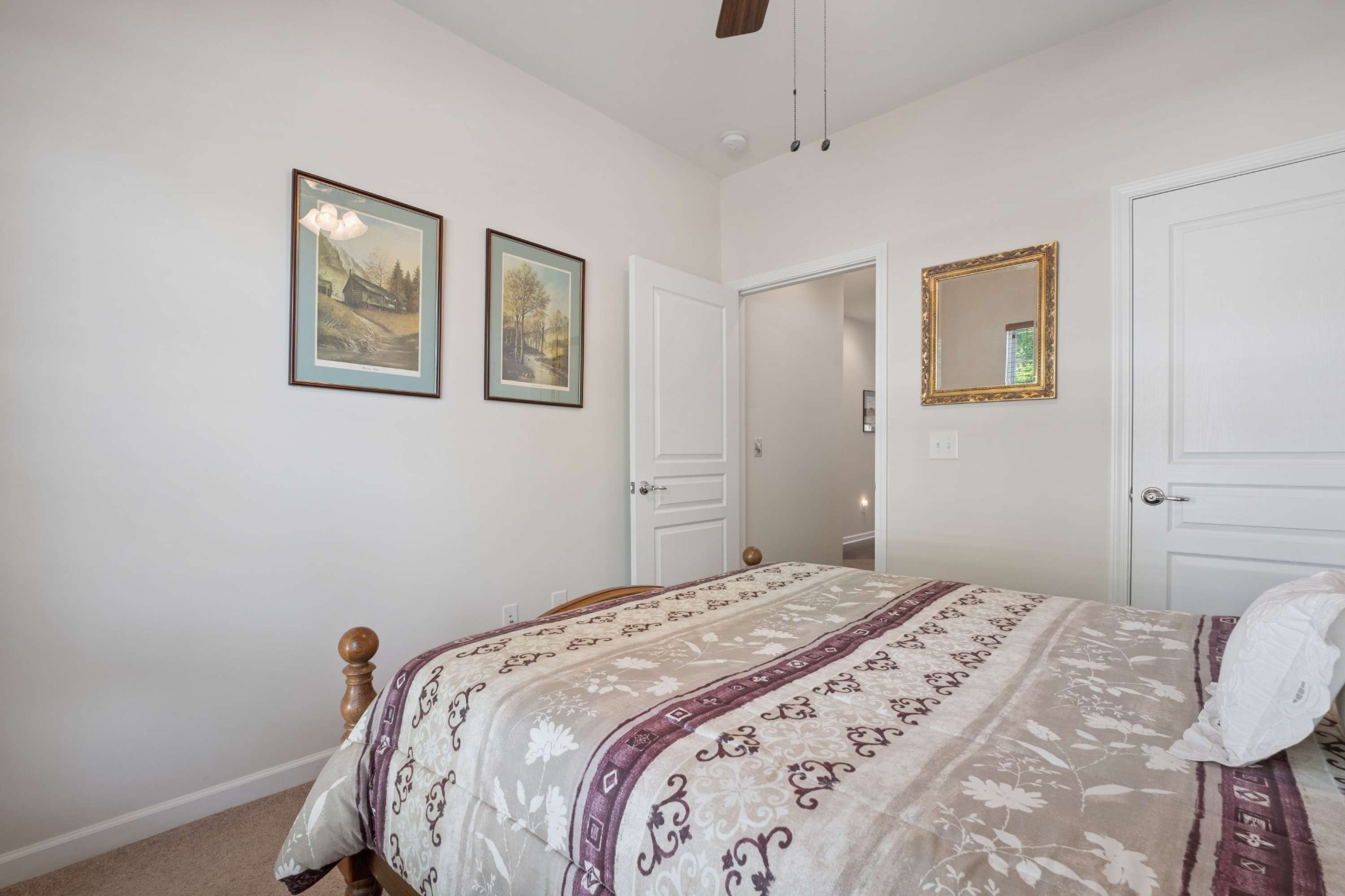 300 Blockade Lane Mount Juliet, TN 37122 - Photo 20 of 36 a bedroom with a bed and a painting on the wall