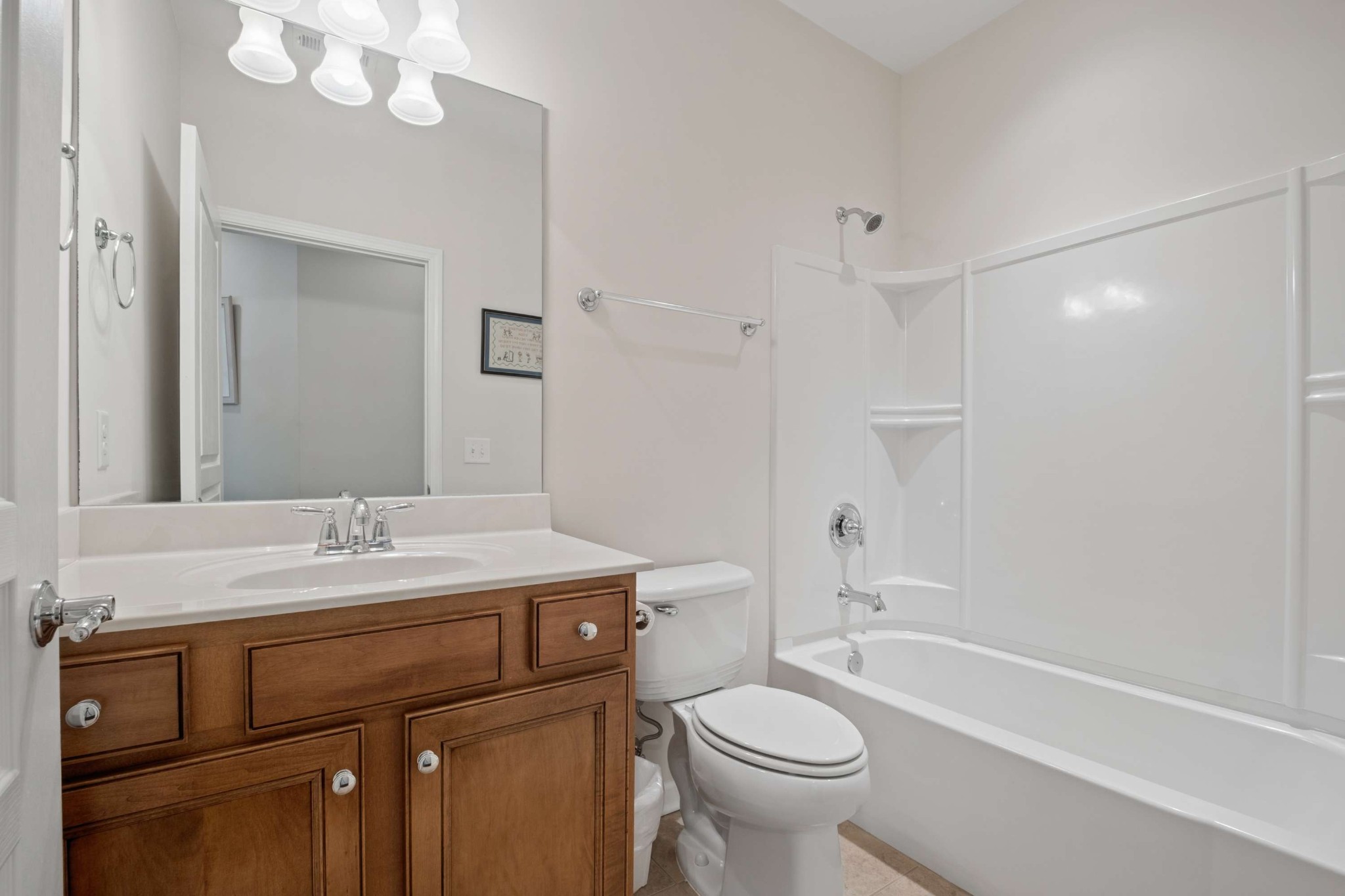300 Blockade Lane Mount Juliet, TN 37122 - Photo 21 of 36 a bathroom with a sink a toilet and shower