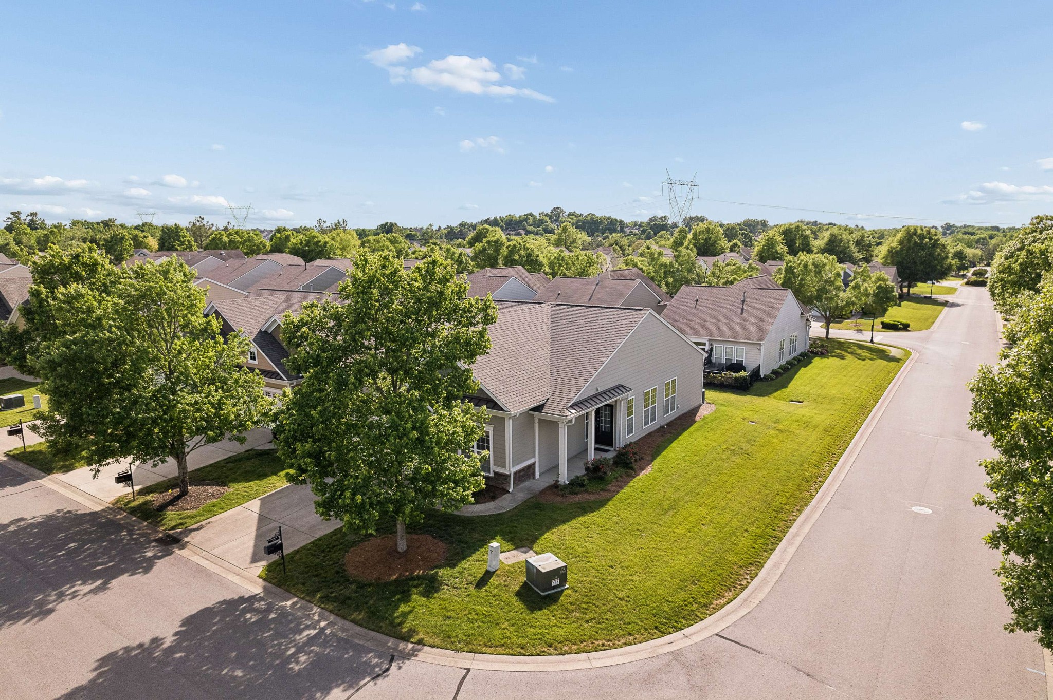 300 Blockade Lane Mount Juliet, TN 37122 - Photo 34 of 36 an aerial view of a house with a garden and lake view