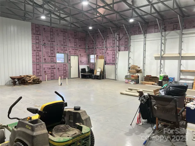 a room with gym equipment and a large window