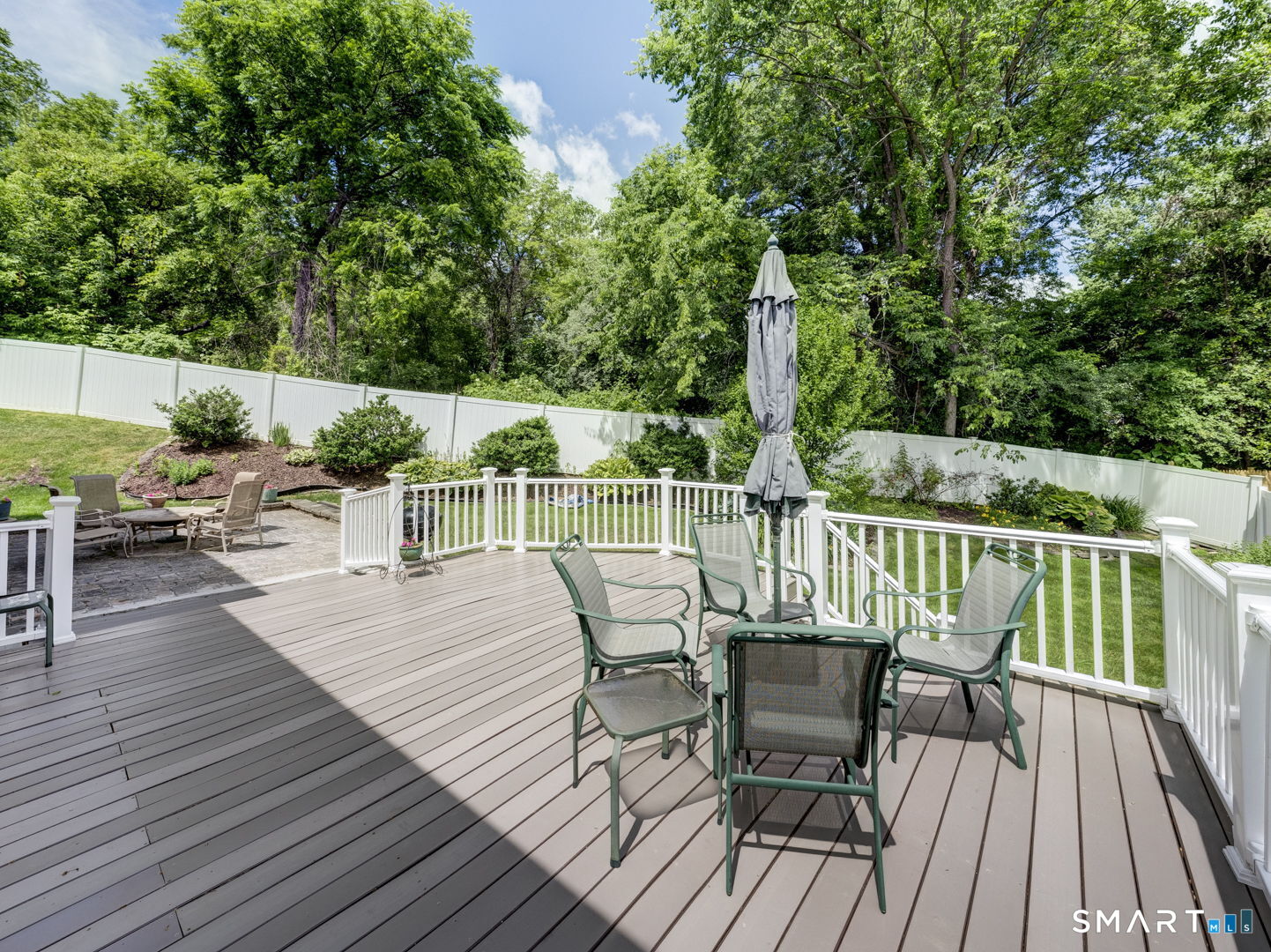 4 Lee Circle Bloomfield, CT 06002 - Photo 31 of 38 Rear deck, stone patio and back yard