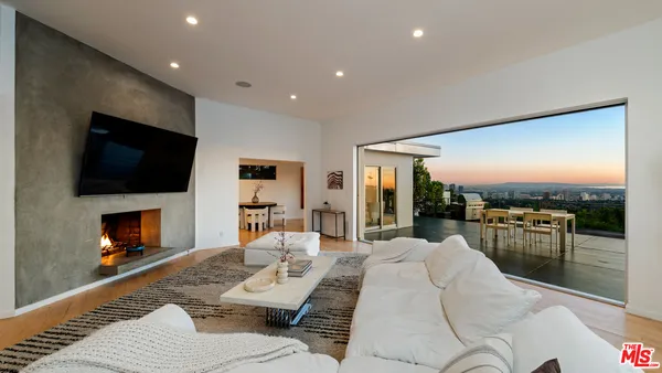 a view of a terrace with furniture