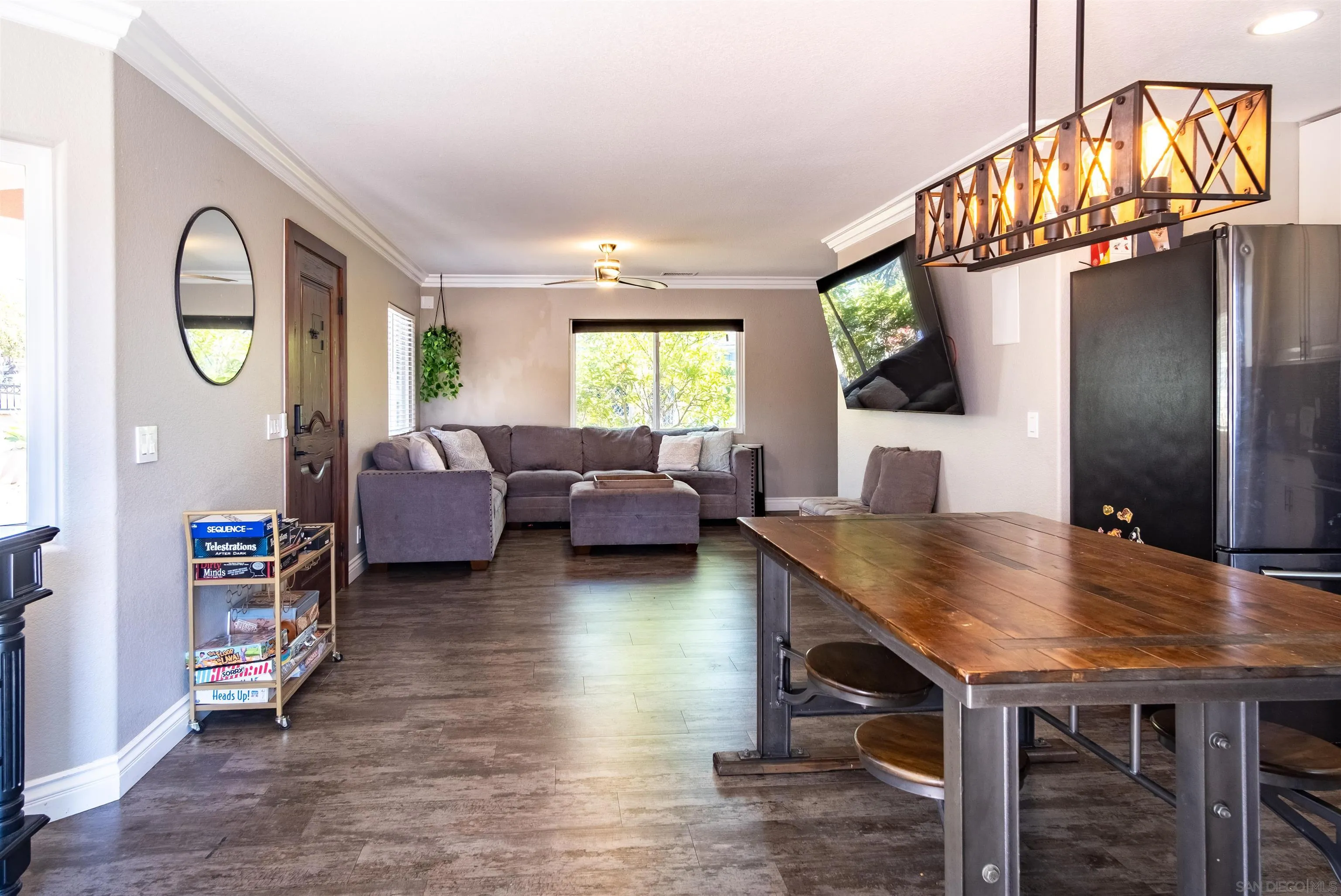 853 Crescent Drive Vista, CA 92084 - Photo 11 of 70 a living room with furniture window and wooden floor