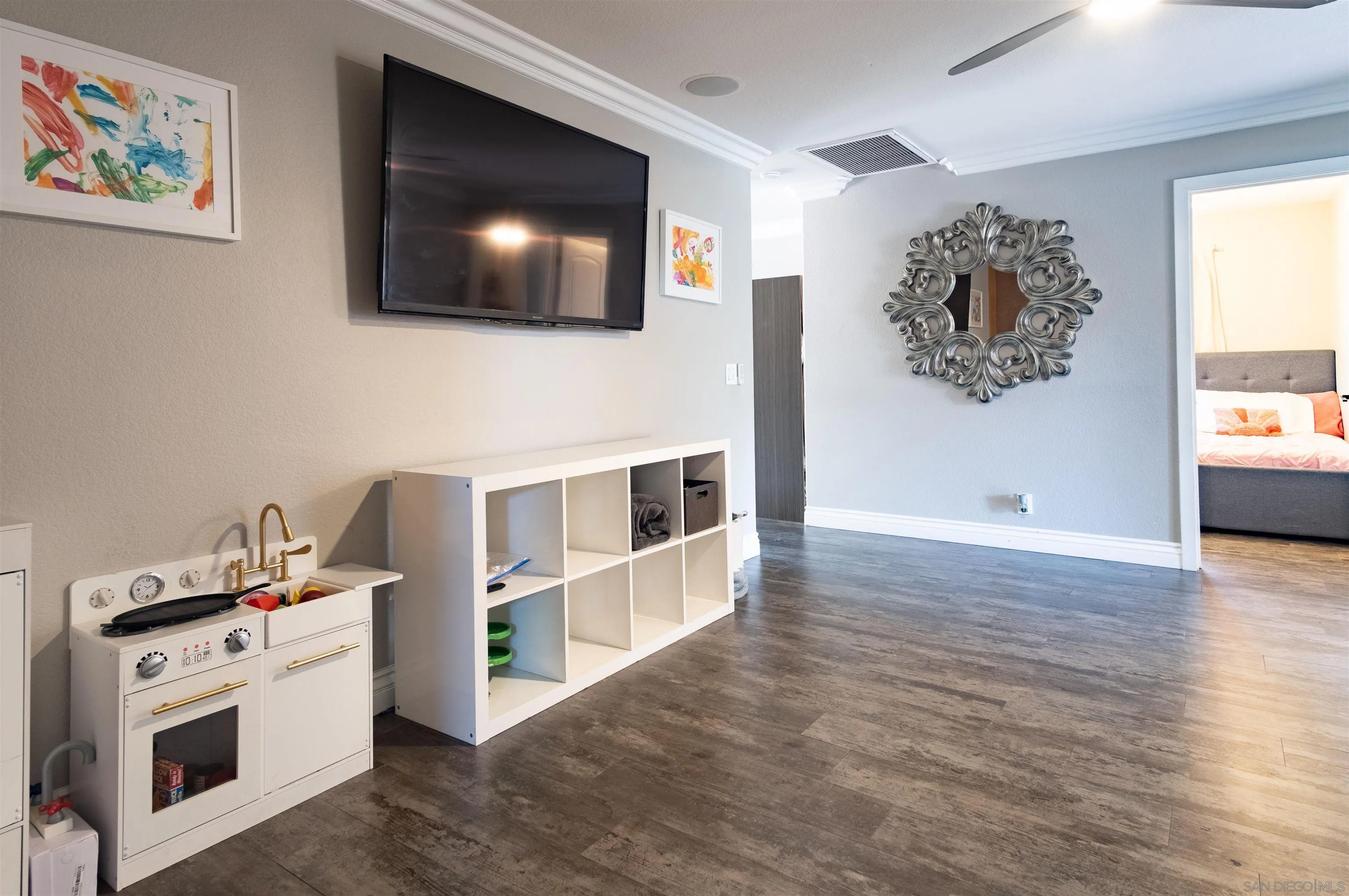 853 Crescent Drive Vista, CA 92084 - Photo 23 of 70 a view of a livingroom with furniture and a flat screen tv