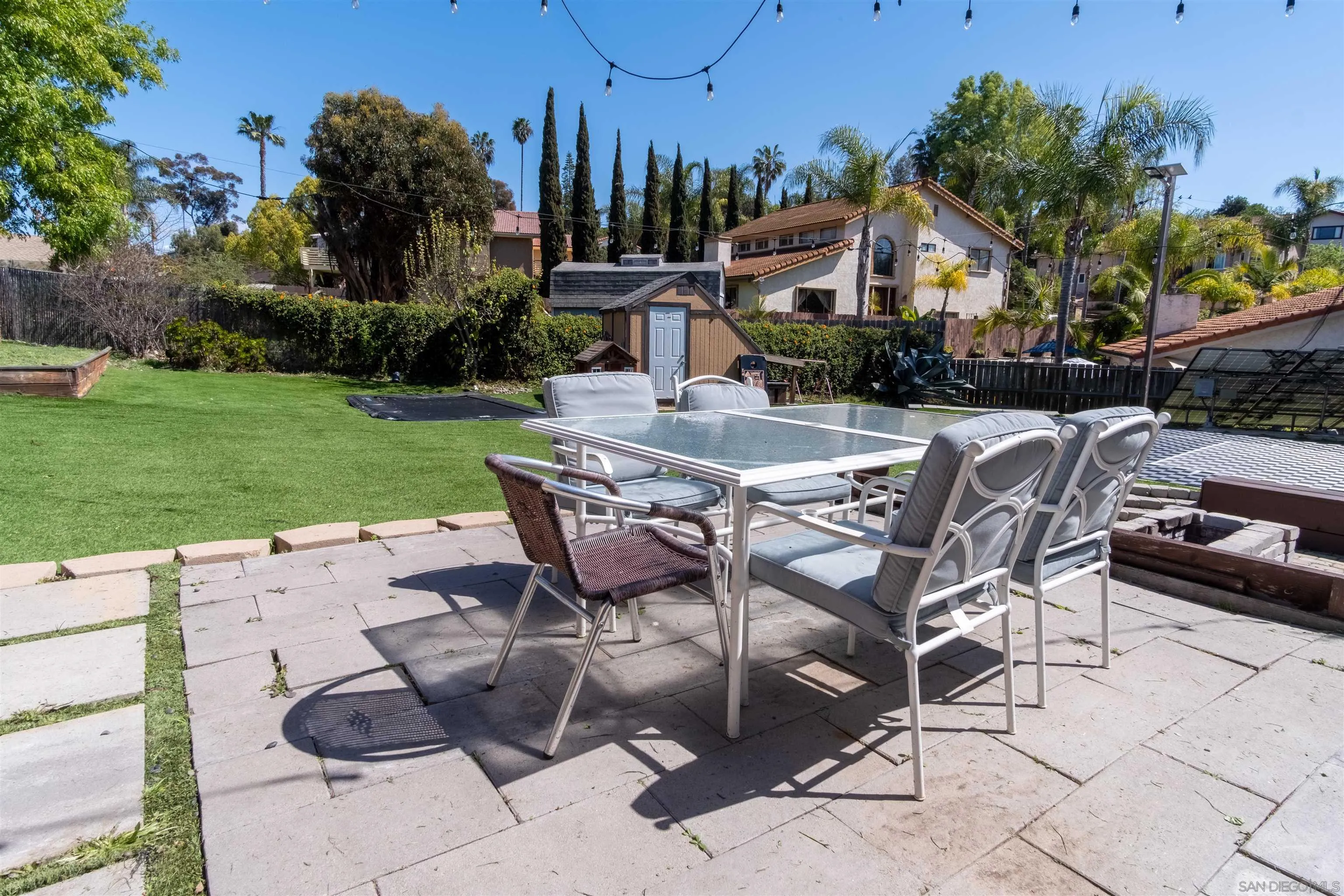853 Crescent Drive Vista, CA 92084 - Photo 44 of 70 a view of a patio with table and chairs and potted plants