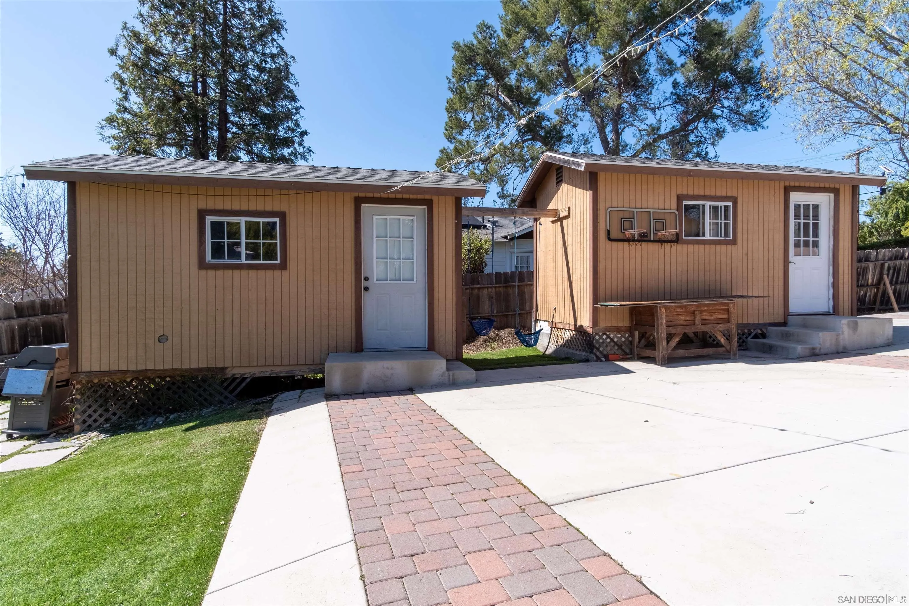 853 Crescent Drive Vista, CA 92084 - Photo 56 of 70 a front view of a house with a yard