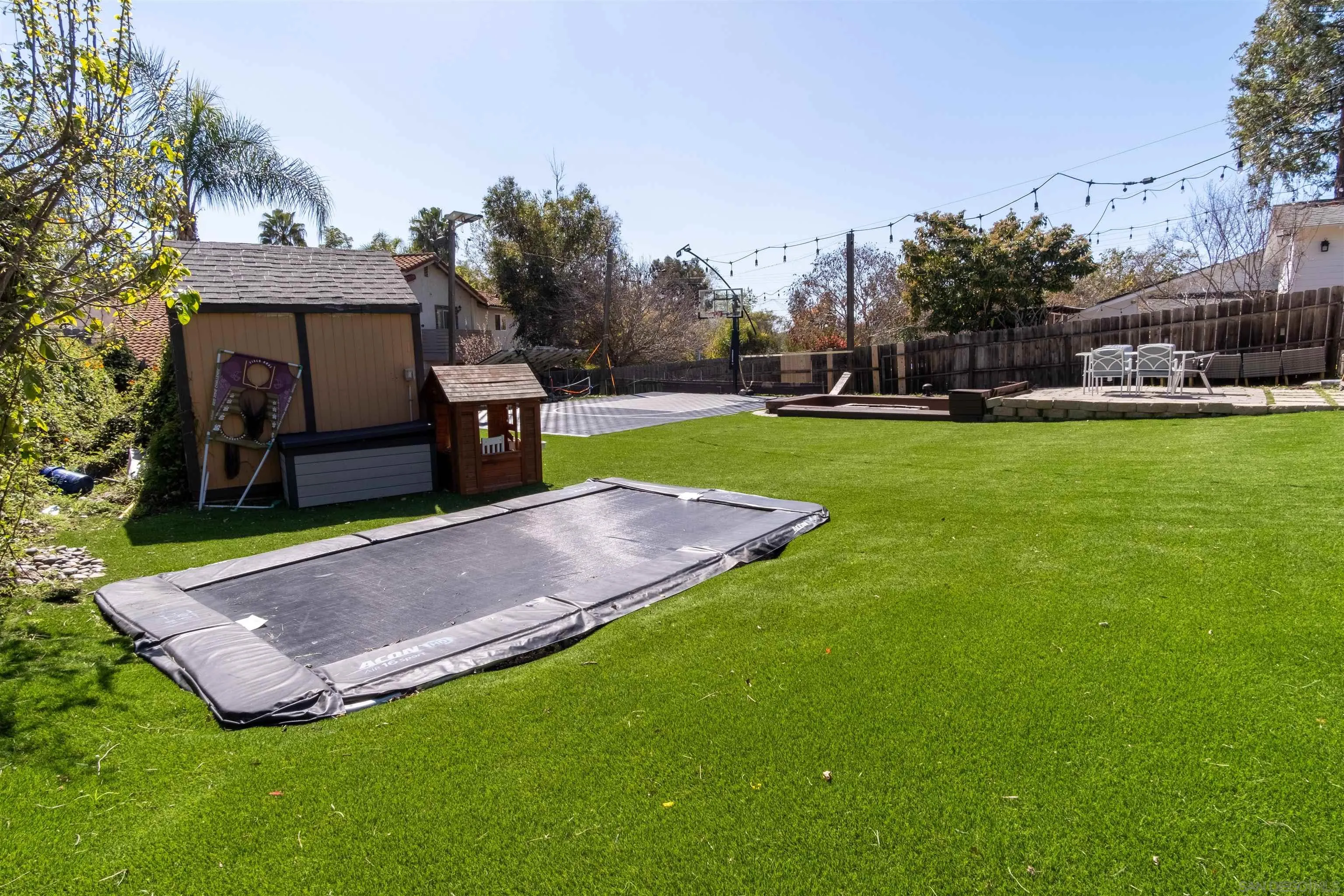 853 Crescent Drive Vista, CA 92084 - Photo 64 of 70 a view of a house with a yard potted plants and a large tree