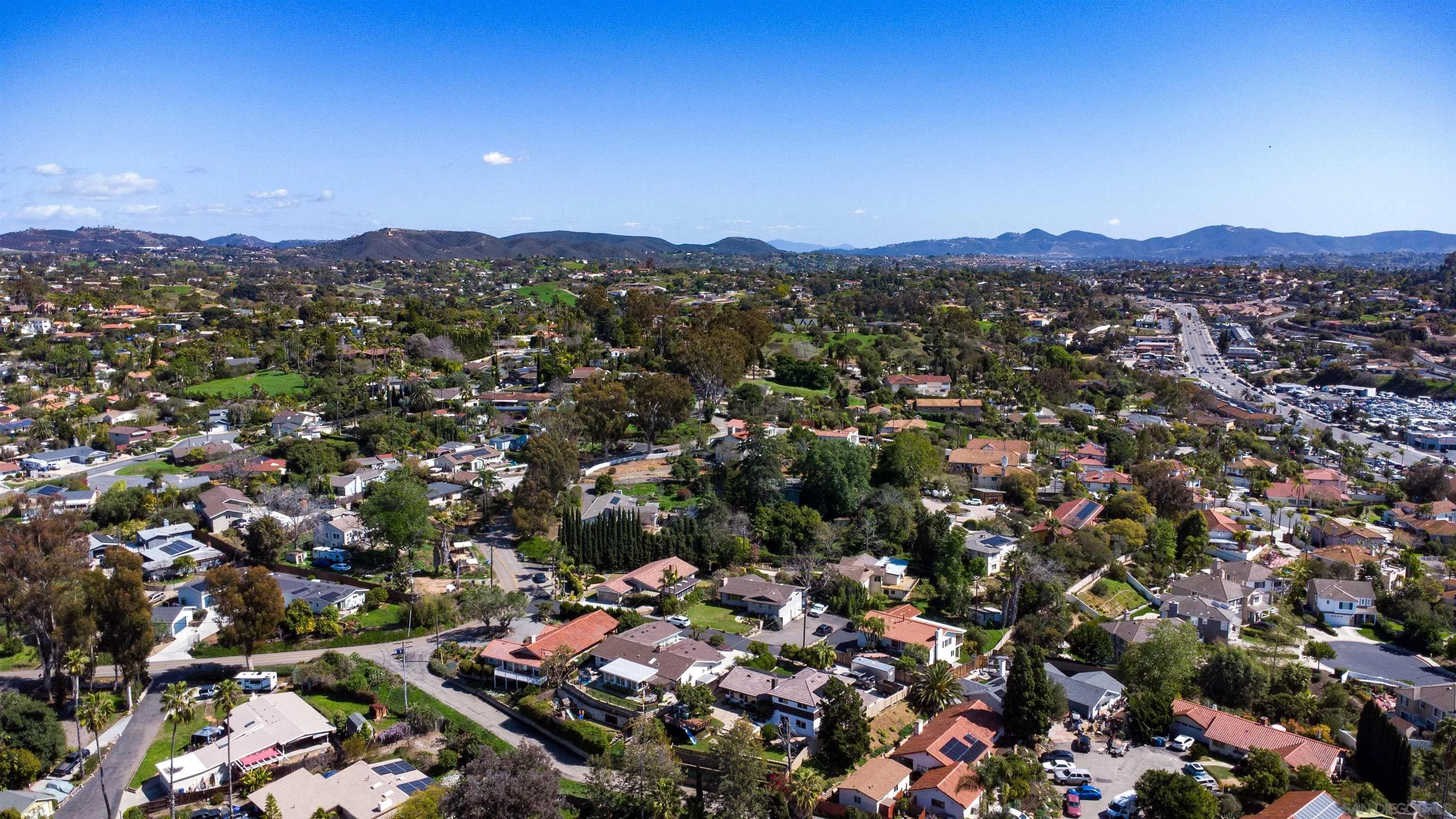 853 Crescent Drive Vista, CA 92084 - Photo 67 of 70 an aerial view of residential houses with outdoor space and trees