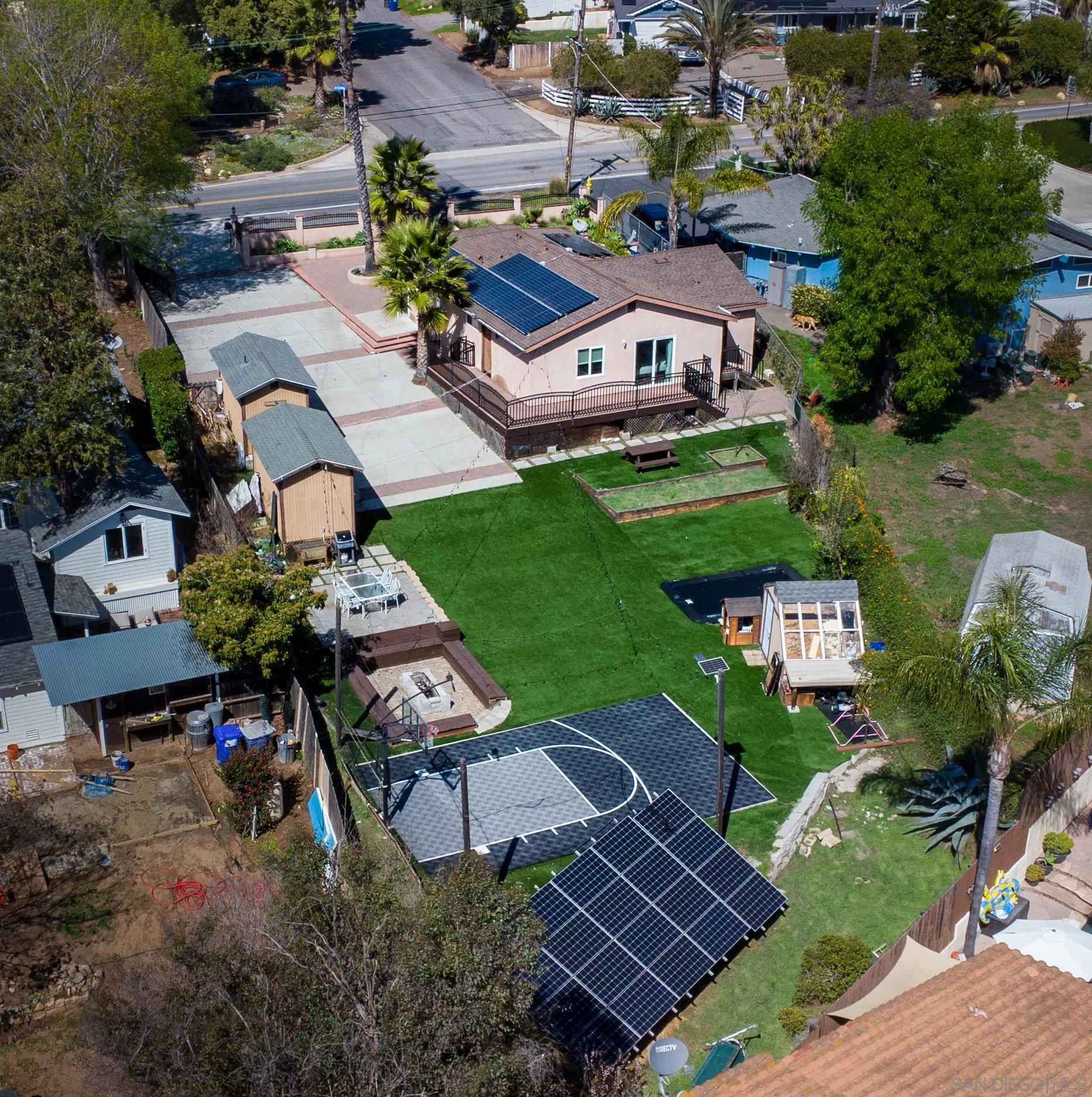 853 Crescent Drive Vista, CA 92084 - Photo 8 of 70 an aerial view of a house with garden space and street view