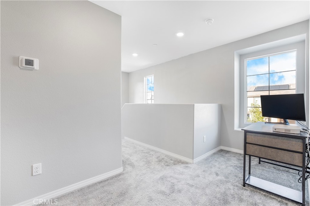 2498 Gunner Ridge Way Rialto, CA 92377 - Photo 12 of 31 a workspace with furniture and window