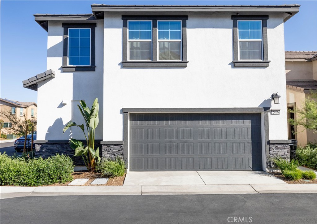 2498 Gunner Ridge Way Rialto, CA 92377 - Photo 2 of 31 front view of a house