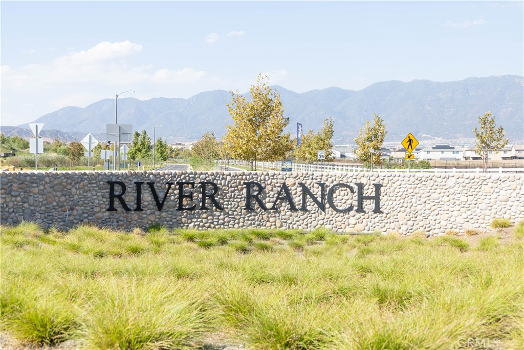 2498 Gunner Ridge Way Rialto, CA 92377 - Photo 27 of 31 a view of a swimming pool with a lake view