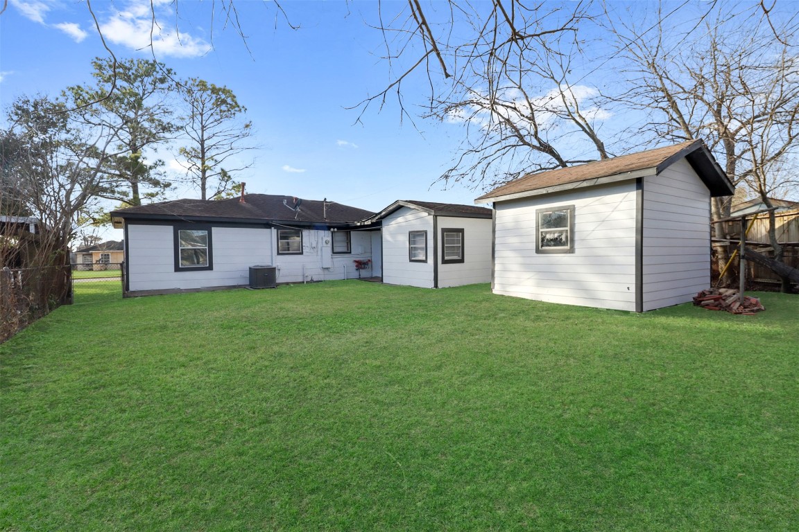 505 Garrett Street Pasadena, TX 77506 - Photo 14 of 14 a front view of house with yard and green space