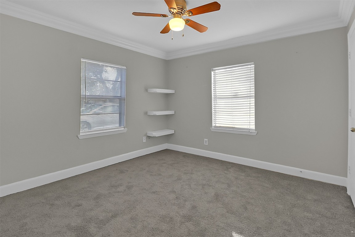 505 Garrett Street Pasadena, TX 77506 - Photo 10 of 14 a view of an empty room with a window