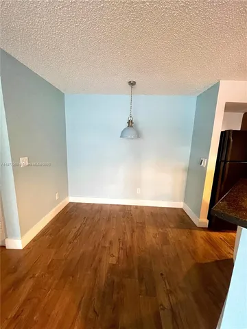 a view of a livingroom with furniture and window