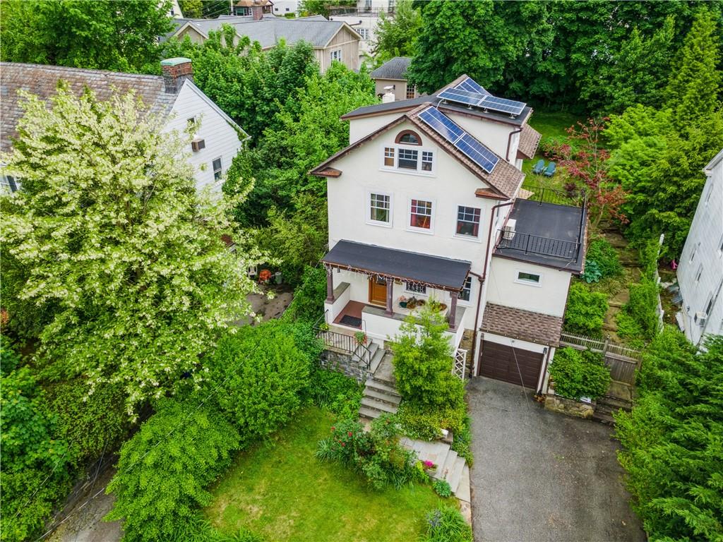 408 Bronxville Road Bronxville, NY 10708 - Photo 1 of 1 a view of a house with a yard and plants