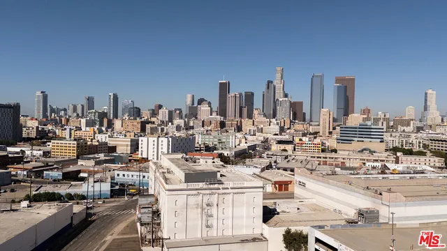 a view of a building with sitting area