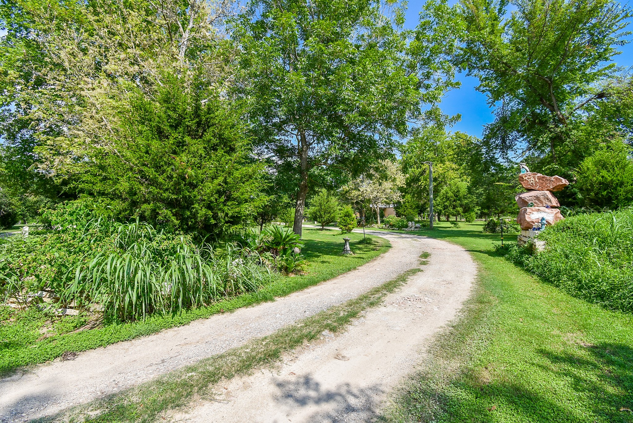 39551 Donigan Road Brookshire, TX 77423 - Photo 6 of 37 View of street with view of wooded area