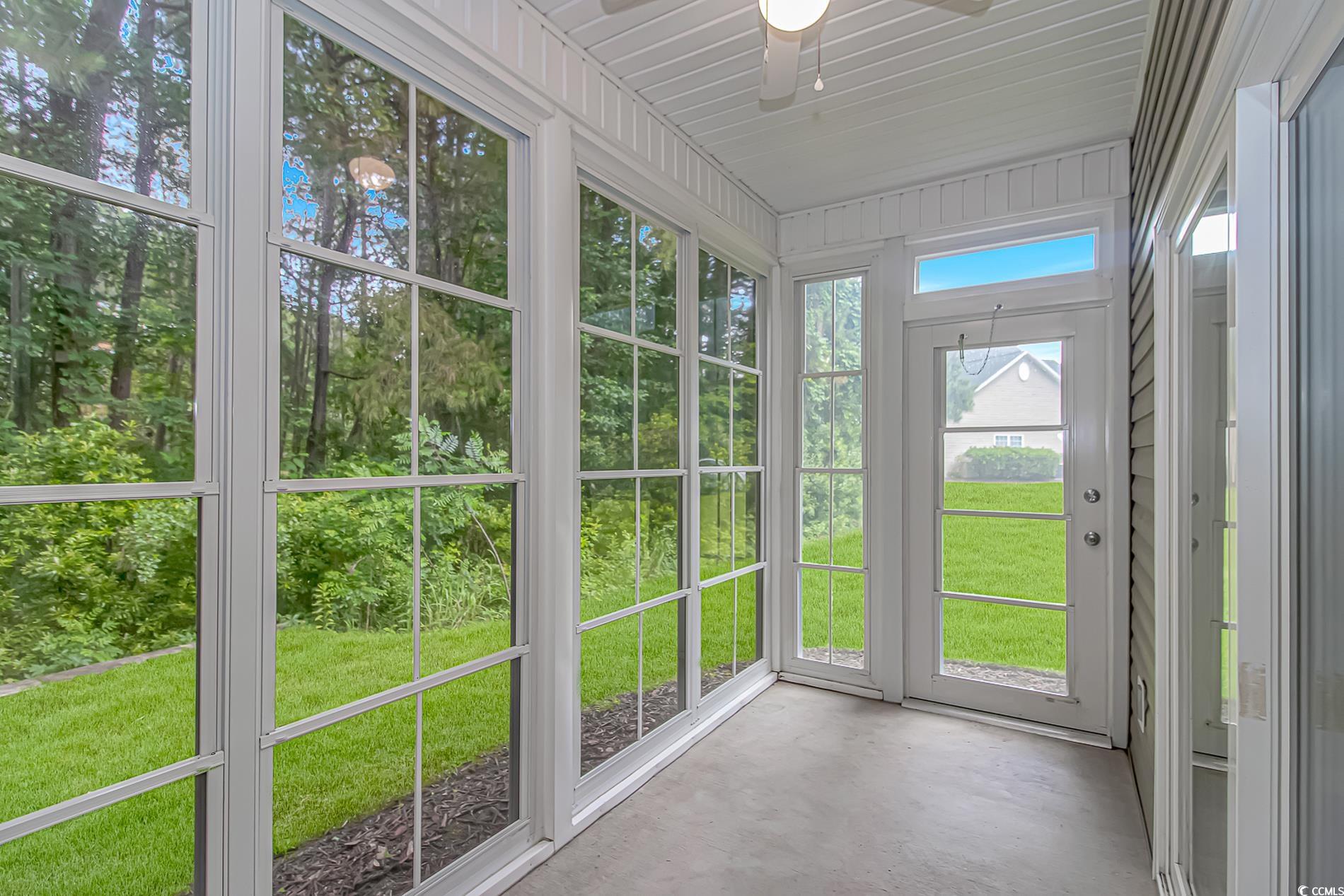 751 Painted Bunting Drive, Unit E Murrells Inlet, SC 29576 - Photo 35 of 40 View of unfurnished sunroom