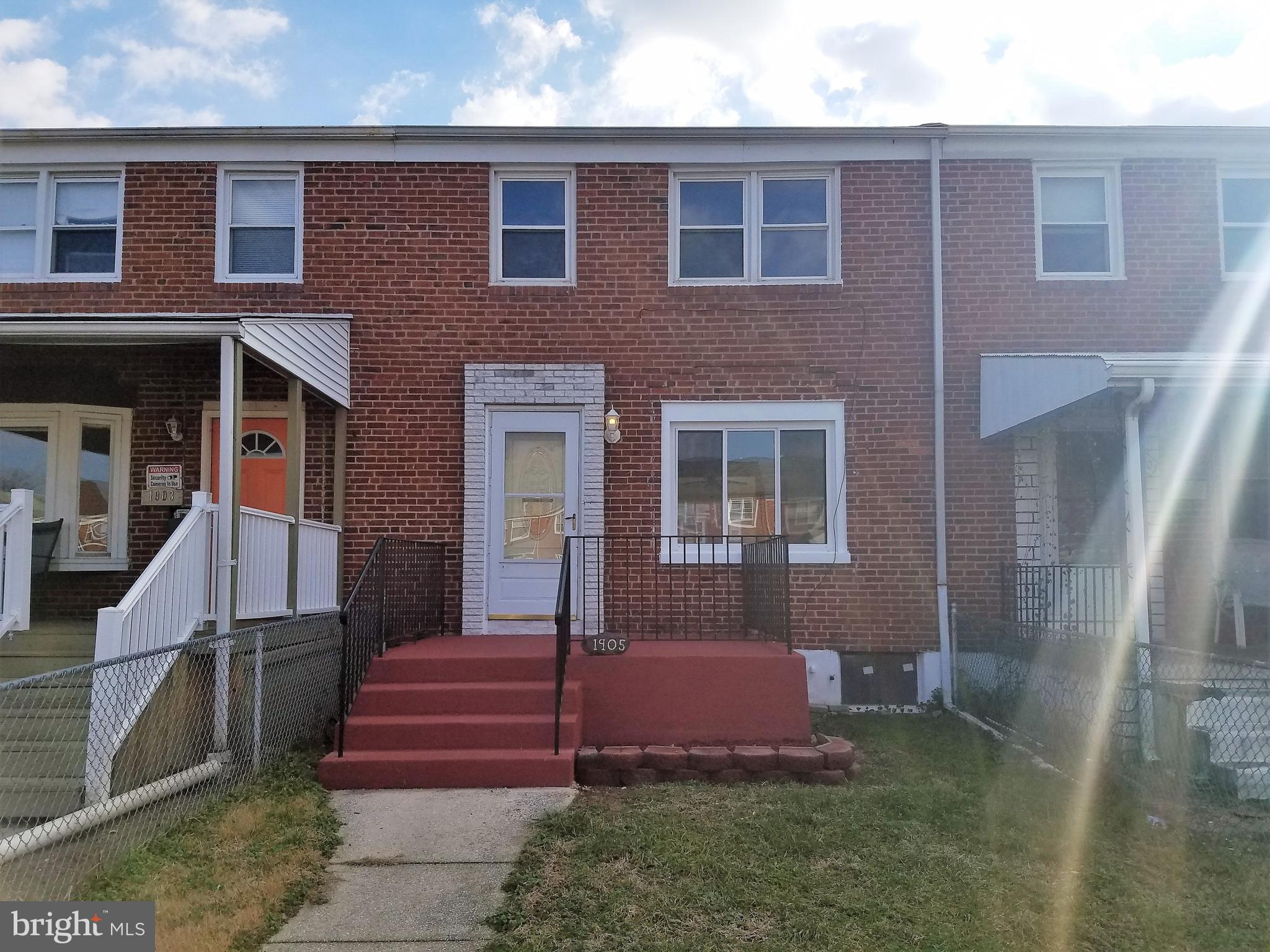 1905 Barry Road Dundalk, MD 21222 - Photo 1 of 23 a front view of a house with a yard