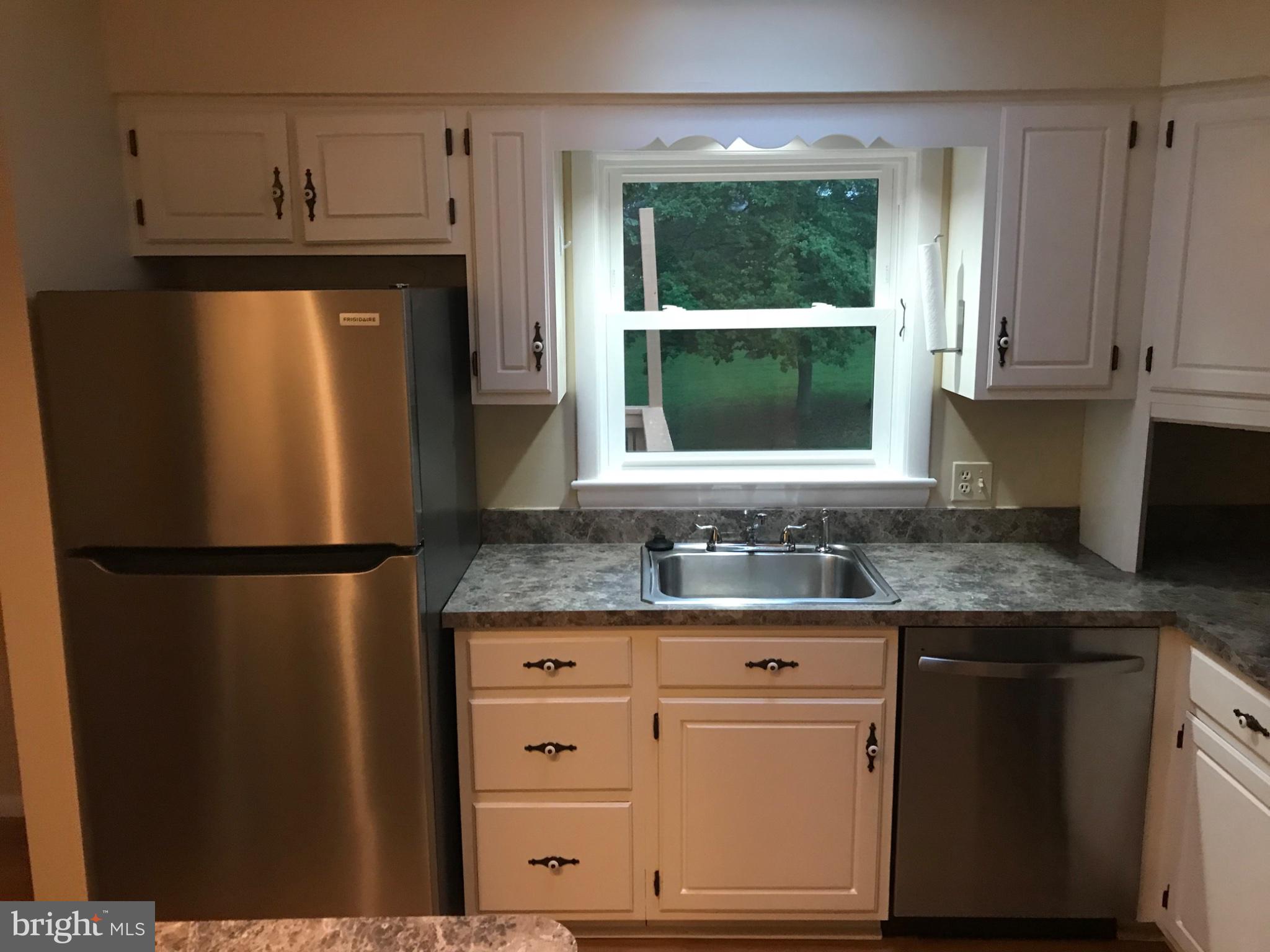 113 Kingsley Road Southwest Vienna, VA 22180 - Photo 10 of 40 Bright and functional kitchen space.