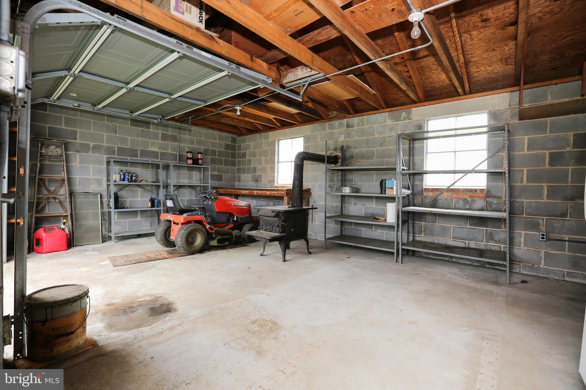 3019 Pyletown Road Boyce, VA 22620 - Photo 40 of 45 Interior of work shop w/ wood stove