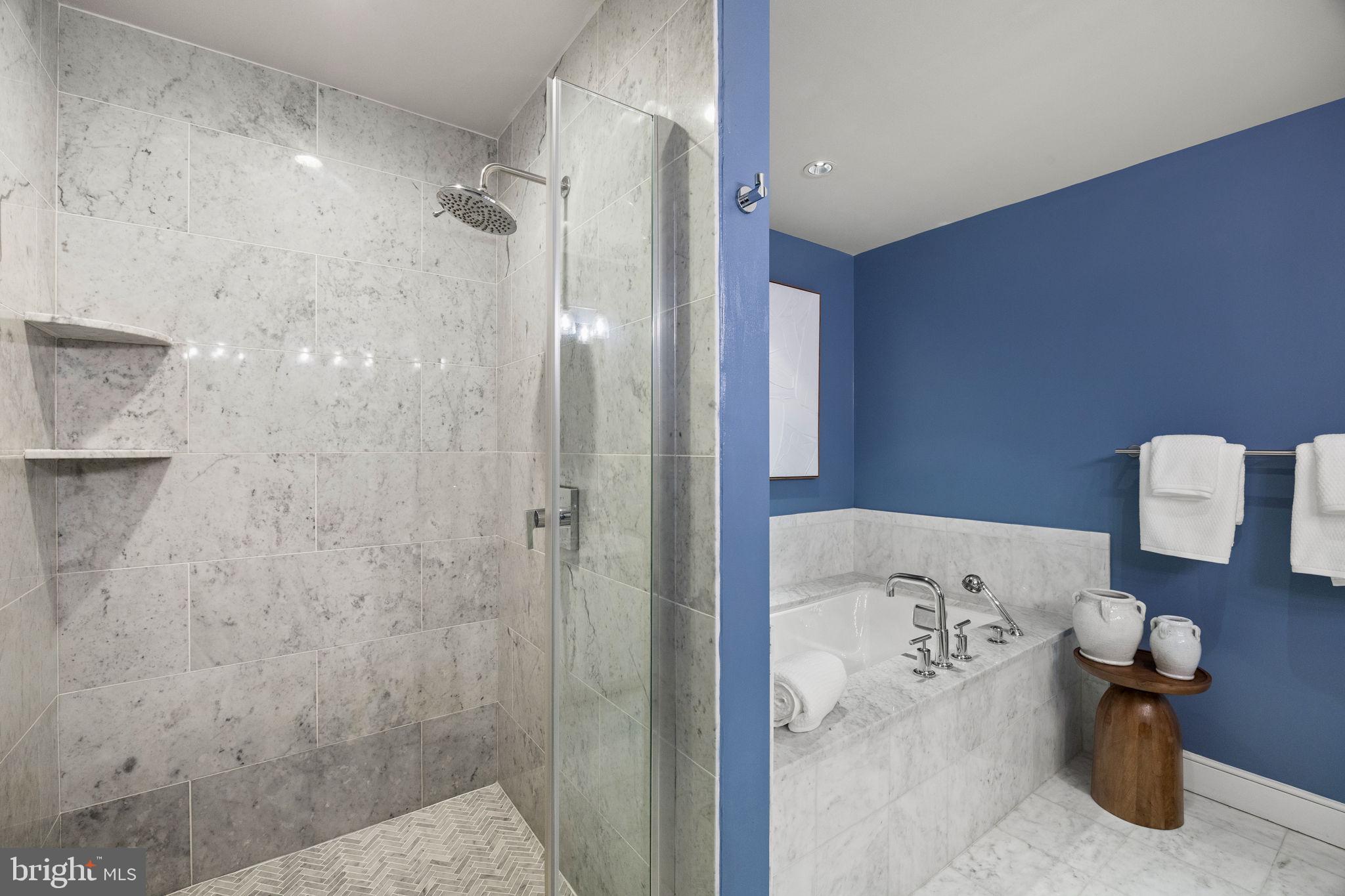 1515 Locust Street, Unit 401 Philadelphia, PA 19102 - Photo 22 of 35 a bathroom with a bathtub and shower