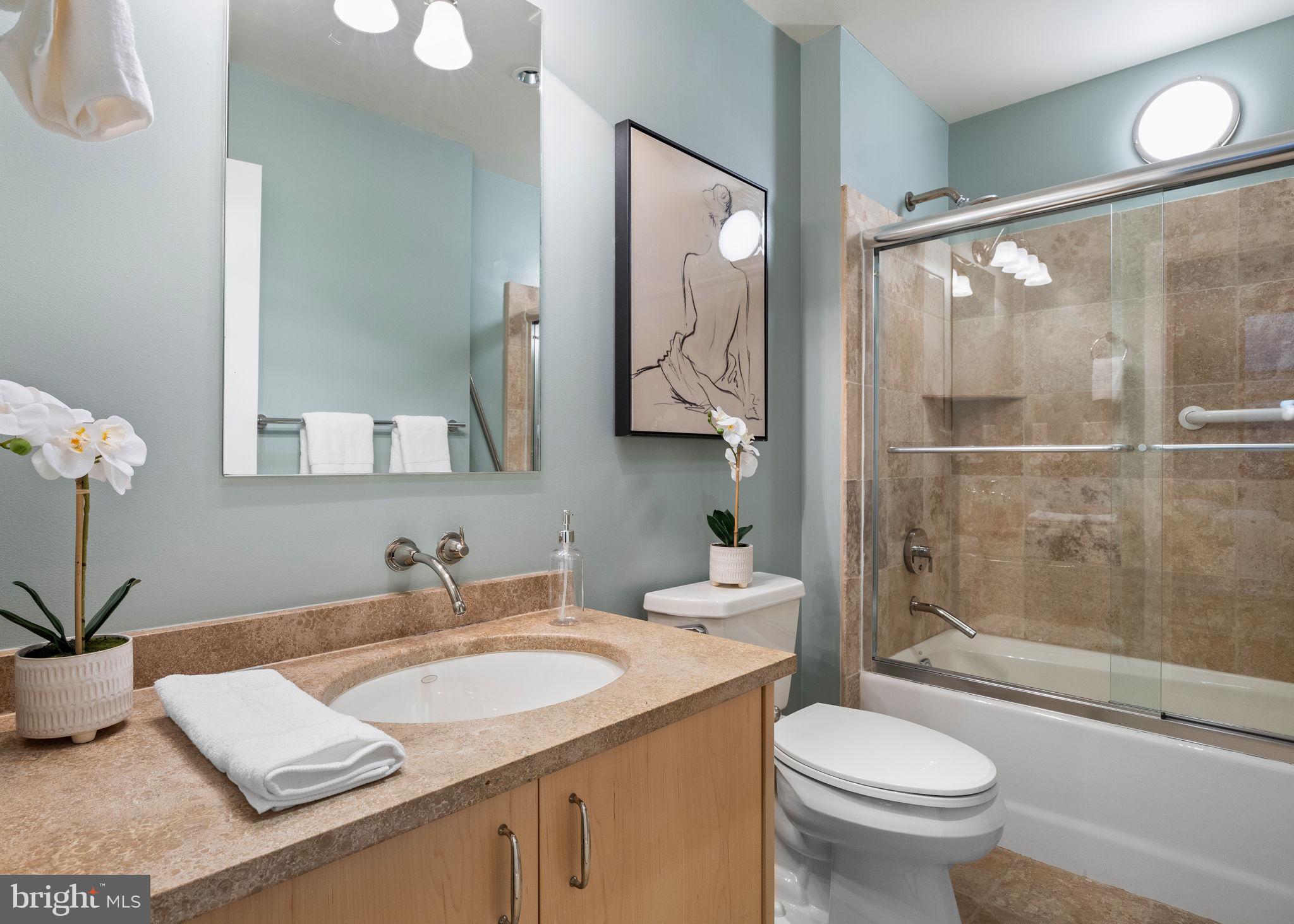 1515 Locust Street, Unit 401 Philadelphia, PA 19102 - Photo 29 of 35 a bathroom with a sink toilet and shower