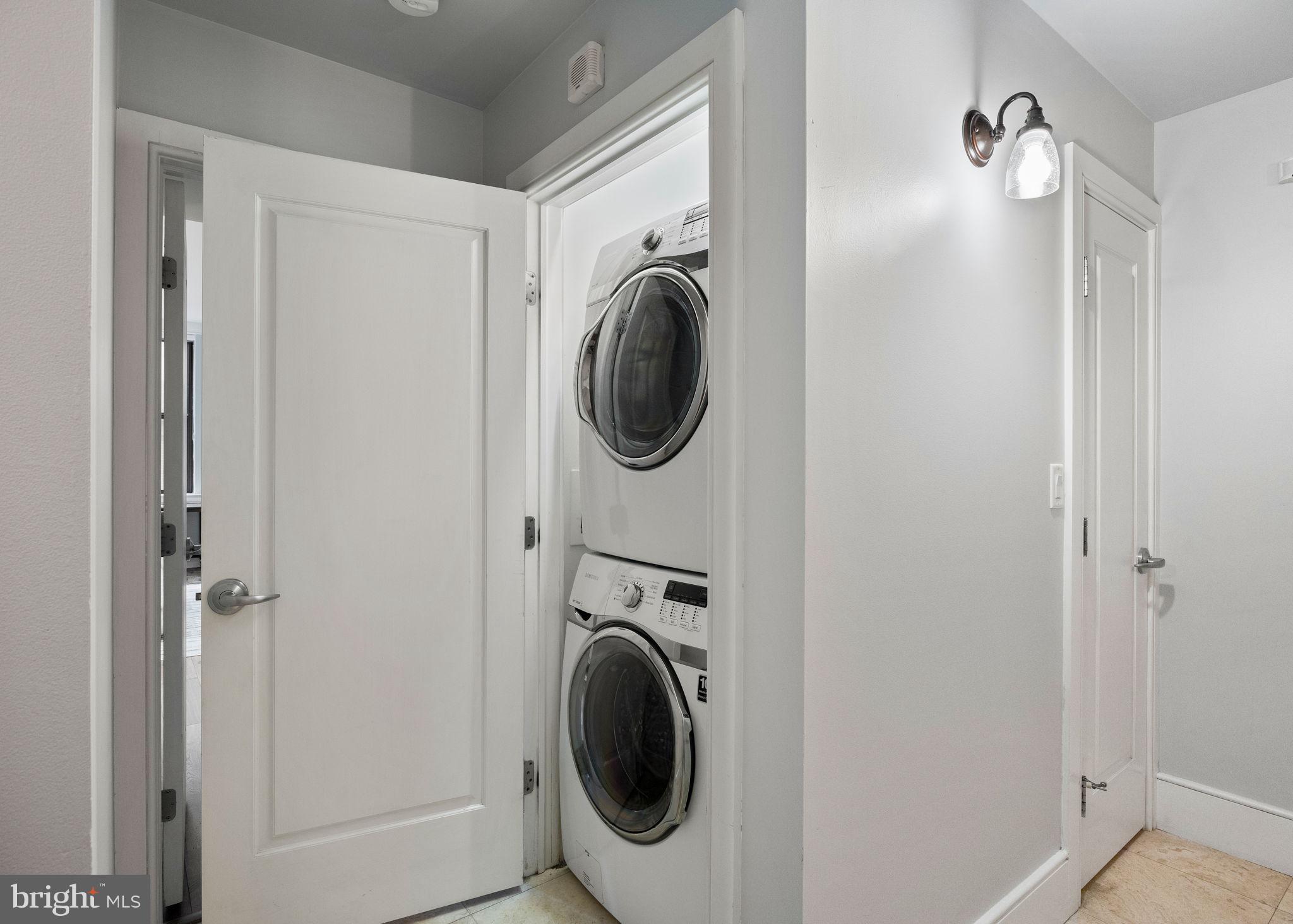 1515 Locust Street, Unit 401 Philadelphia, PA 19102 - Photo 30 of 35 a utility room with dryer and washer