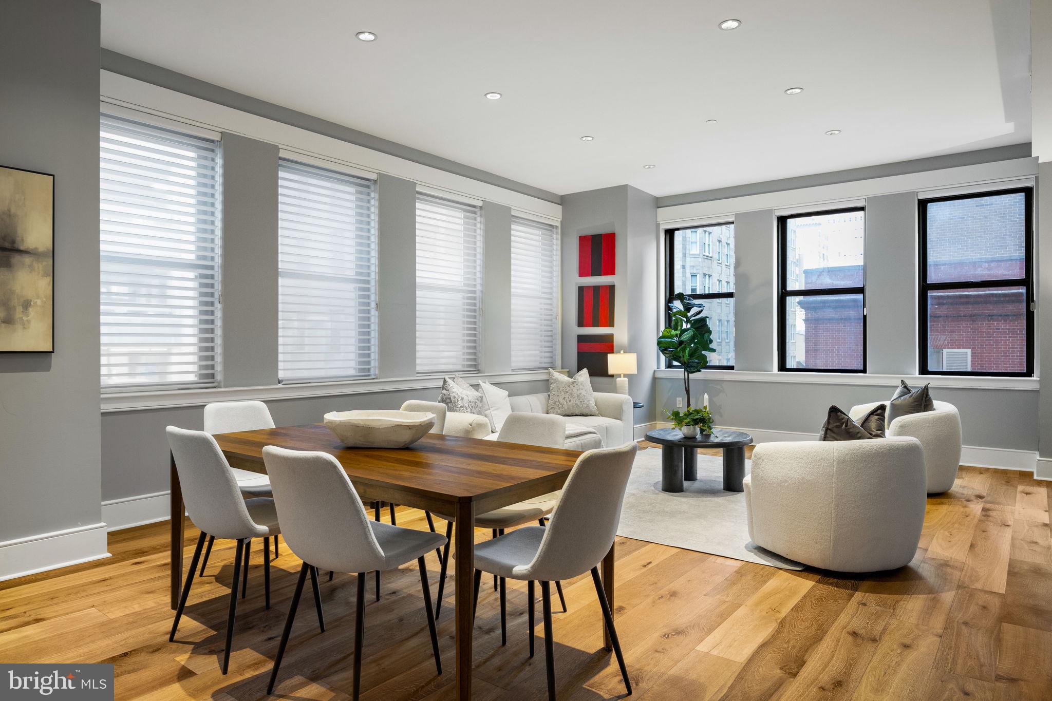 1515 Locust Street, Unit 401 Philadelphia, PA 19102 - Photo 3 of 35 a view of a dining room with furniture and window